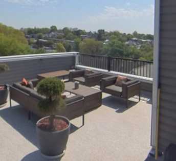 Man putting on shingles